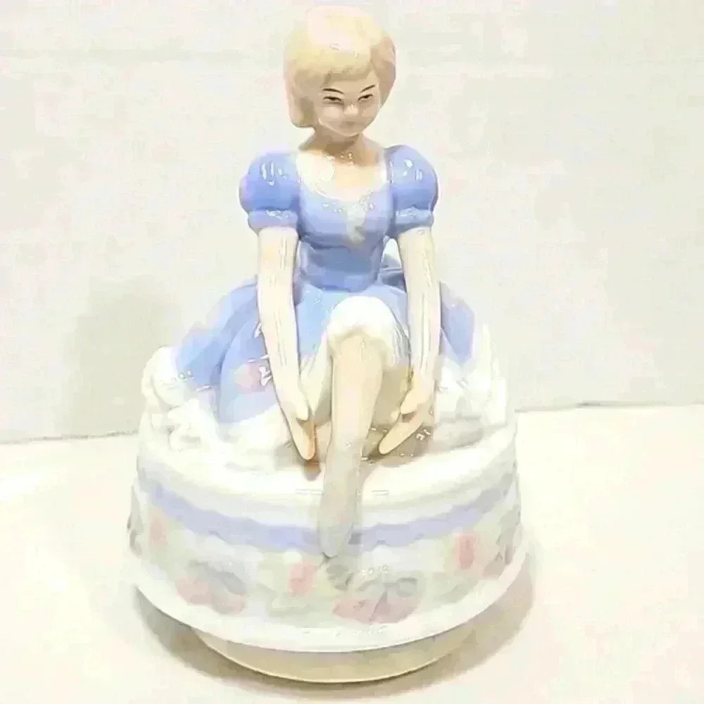 Ballerina porcelain girl with music box rotate blue white plays music